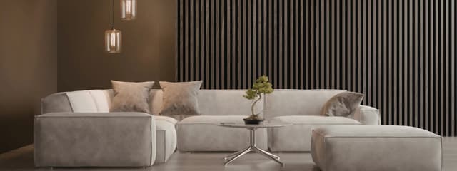 Soft neutral living room with a sculptural sofa